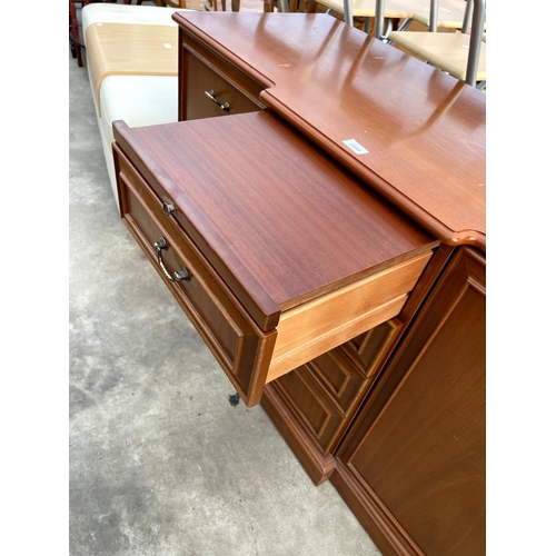 2850 - A PARKER KNOLL BREAKFRONT SIDEBOARD ENCLOSING FOUR DRAWERS, TWO CUPBOARDS AND SLIDE, 50