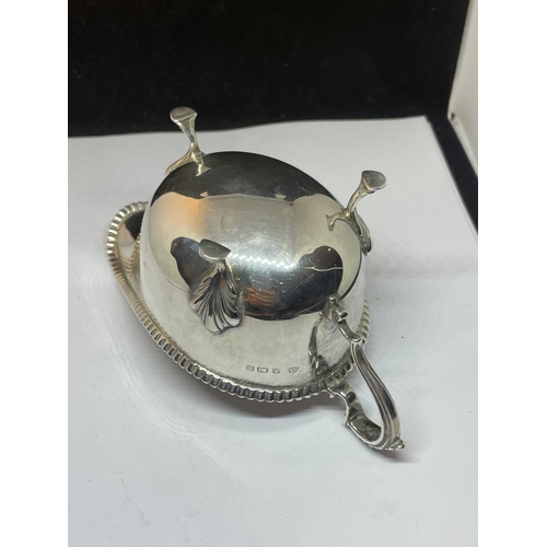 12 - A HALLMARKED BIRMINGHAM SILVER THREE LEGGED SAUCE BOAT