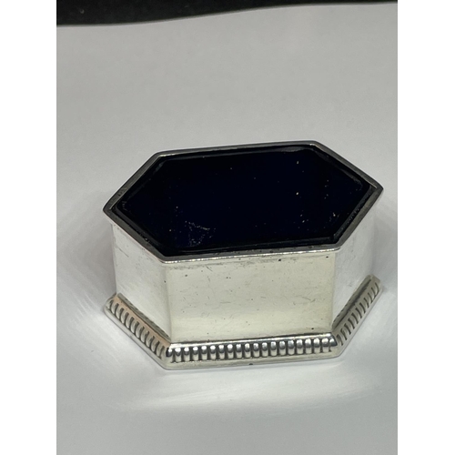 91 - A CHESTER HALLMARKED WALKER AND HALL HEXAGONAL SALT WITH BLUE GLASS LINER