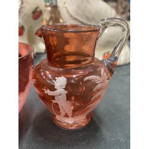 105 - TWO PIECES OF VINTAGE MARY GREGORY HAND BLOWN CRANBERRY GLASS, TO INCLUDE A JUG, HEIGHT 9CM AND A BO... 