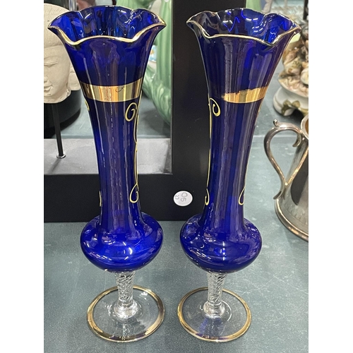 109 - A PAIR OF VINTAGE BOHEMIAN GLASS VASES IN COBALT BLUE WITH HANDPAINTED FLORAL DECORATION, HEIGHT 26C... 