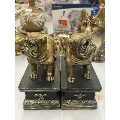 141 - A PAIR OF BULLDOG FIGURES ON PLINTHS, HEIGHT 17CM, WIDTH 15CM