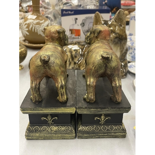 141 - A PAIR OF BULLDOG FIGURES ON PLINTHS, HEIGHT 17CM, WIDTH 15CM