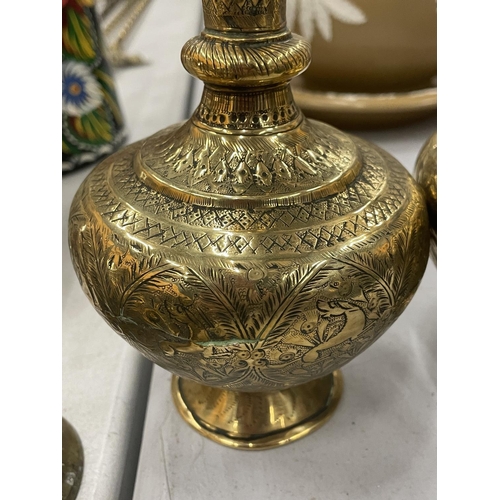 146 - A PAIR OF LIDDED BRASS VASES, HEIGHT 22CM