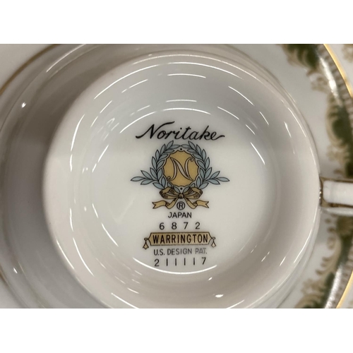 157 - A NORITAKE PART DINNER SERVICE TO INCLUDE A SERVING BOWL AND PLATE, VARIOUS SIZES OF PLATES, CREAM J... 