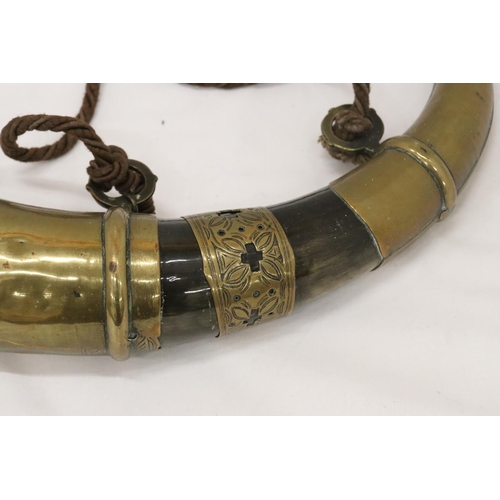 183 - AN ISLAMIC BRASS BOUND POWDER HORN