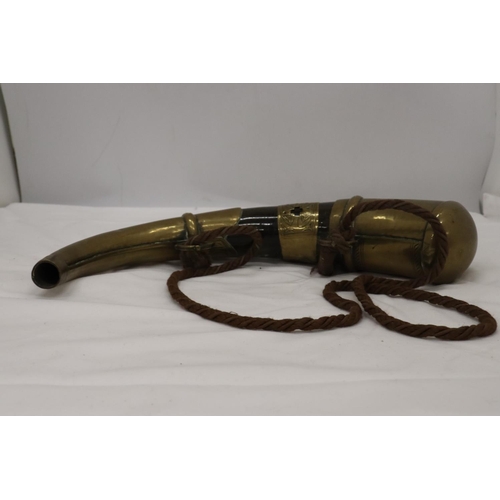 183 - AN ISLAMIC BRASS BOUND POWDER HORN