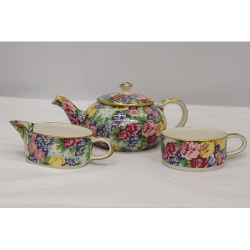 184 - A ROYAL WINTON, CHINTZ, 'JULIA' PATTERN SMALL TEAPOT, CREAM JUG AND SUGAR BOWL