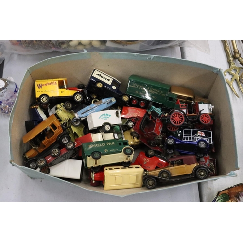 193 - A LARGE COLLECTION OF DIECAST CARS AND VANS