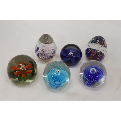 199 - SIX GLASS PAPERWEIGHTS