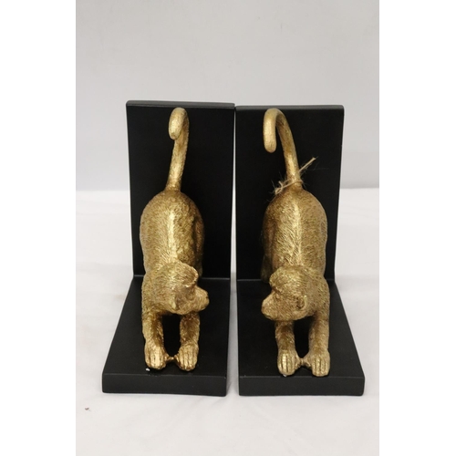 200 - A PAIR OF GOLD COLOURED RESIN MONKEY, BOOK-ENDS, HEIGHT 19CM