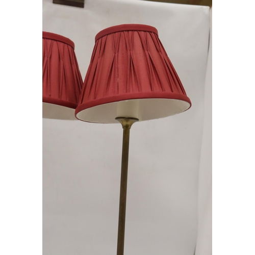 209 - A PAIR OF LAMPS WITH PLEATED SHADES AND BRASS STANDS