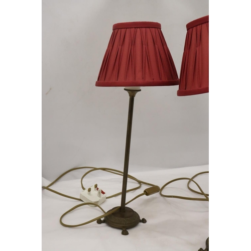 209 - A PAIR OF LAMPS WITH PLEATED SHADES AND BRASS STANDS