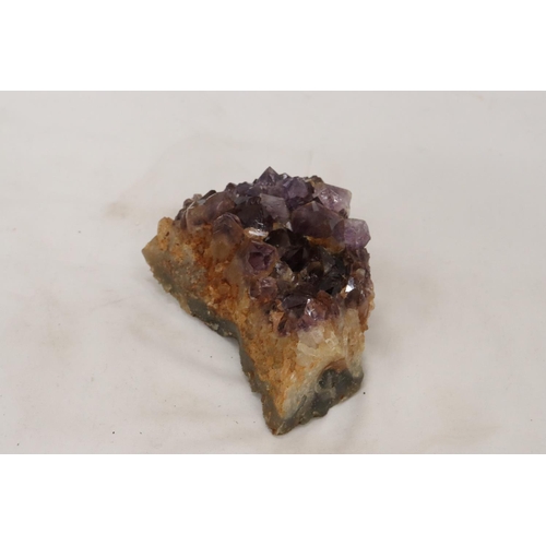 213 - AN AMETHYST DRUZE GEODE QUART CRYSTAL