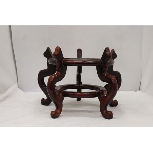 218 - A LARGE WOODEN CHINESE CARVED PEDESTAL TOGETHER WITH A VINTAGE WOODEN MASK