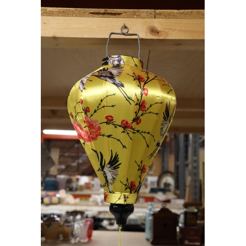 241 - AN ORIENTAL SILK LANTERN