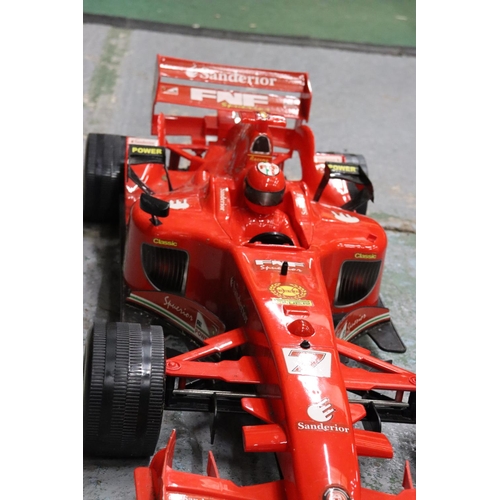 244 - A LARGE FORMULA ONE FERRARI RACING CAR 37 INCH LONG