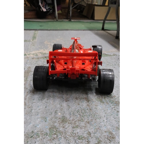 244 - A LARGE FORMULA ONE FERRARI RACING CAR 37 INCH LONG