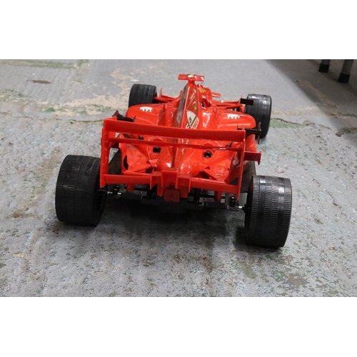 244 - A LARGE FORMULA ONE FERRARI RACING CAR 37 INCH LONG