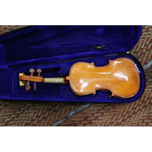 248 - A STENTOR STUDENT 1/4 VIOLIN IN A CASE