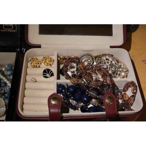 251 - A LARGE QUANTITY OF COSTUME JEWELLERY