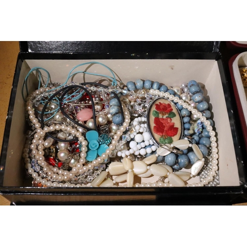 251 - A LARGE QUANTITY OF COSTUME JEWELLERY