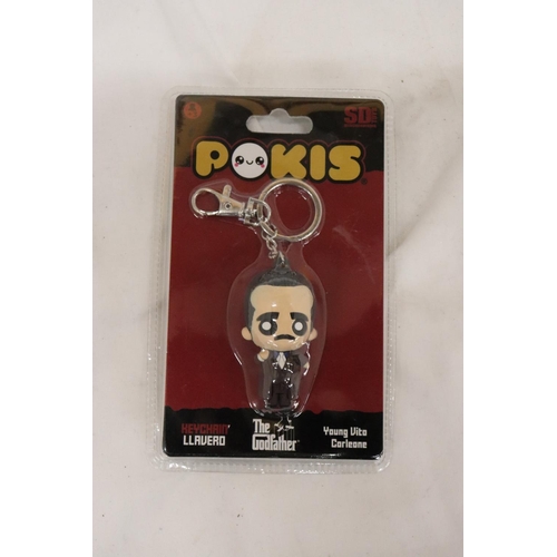 252 - TWO COLLECTABLE 'POKIS' KEYCHAINS TO INCLUDE THE GODFATHER AND SCARFACE