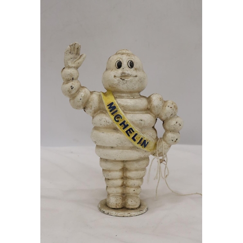 258 - A CAST MICHELIN MAN FIGURE APPROX 21 CM TALL