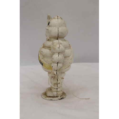 258 - A CAST MICHELIN MAN FIGURE APPROX 21 CM TALL