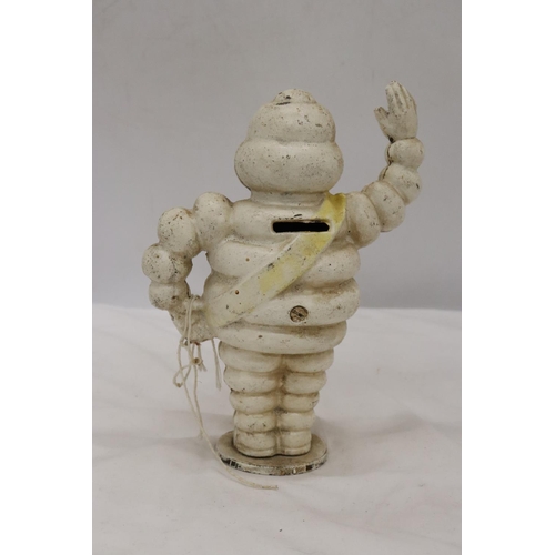 258 - A CAST MICHELIN MAN FIGURE APPROX 21 CM TALL