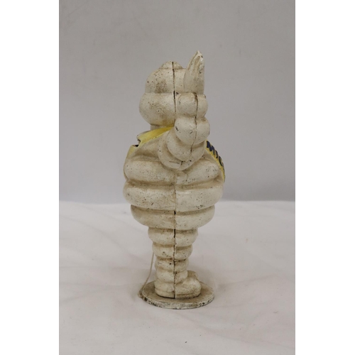 258 - A CAST MICHELIN MAN FIGURE APPROX 21 CM TALL