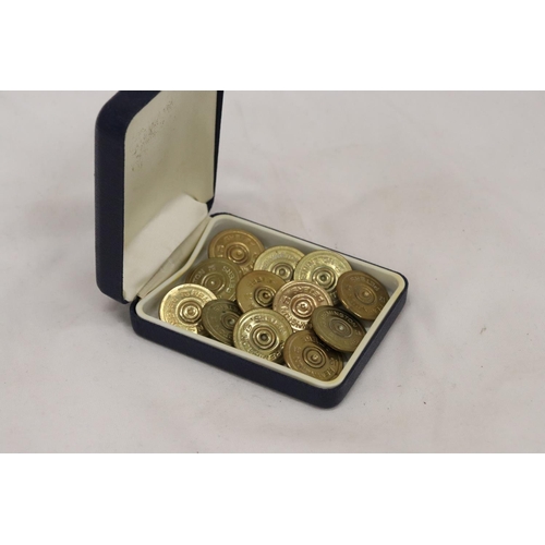 259 - A SET OF TWELVE REMINGTON TWELVE GAUGE SHOTGUN BUTTONS