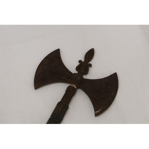 264 - A VINTAGE DOUBLE HEADED GRYPHON AXE