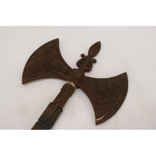 264 - A VINTAGE DOUBLE HEADED GRYPHON AXE