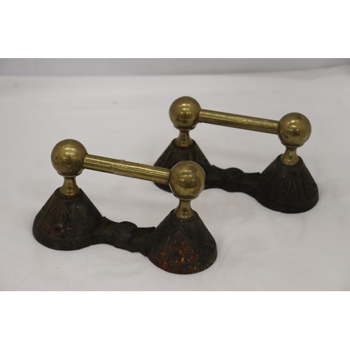 265 - A PAIR OF VICTORIAN ORNATE BRASS CAST FIRE DOGS