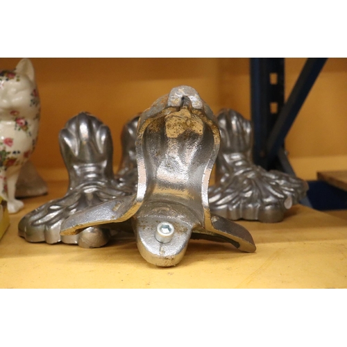 266 - A SET OF FOUR HEAVY CHROME CAST BALL AND CLAW ORNATE FEET, 10 INCH X 8 INCH