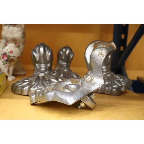 266 - A SET OF FOUR HEAVY CHROME CAST BALL AND CLAW ORNATE FEET, 10 INCH X 8 INCH