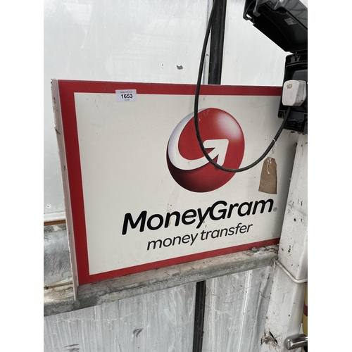 1653 - A METAL 'MONEYGRAM' WALL MOUNTED SIGN