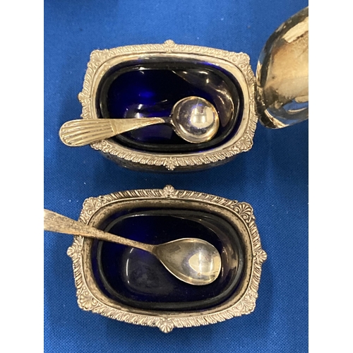 32 - A HALLMARKED BIRMINGHAM SILVER CONDIMENT SET TO INCLUDE A BLUE GLASS LINED SALT AND LIDDED MUSTARD P... 