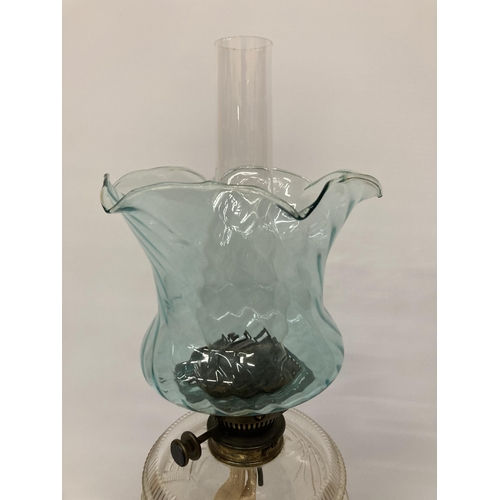 36 - A VINTAGE OIL LAMP WITH BRASS BASE, CLEAR CUT GLASS OIL RESERVOIR, TURQUOISE SHADE AND GLASS FUNNEL