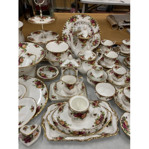 37 - A VERY LARGE COLLECTION OF ROYAL ALBERT OLD COUNTRY ROSES TO INCLUDE TRIOS, JUGS, SUGAR BOWLS, COFFE... 