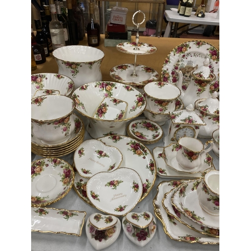 37 - A VERY LARGE COLLECTION OF ROYAL ALBERT OLD COUNTRY ROSES TO INCLUDE TRIOS, JUGS, SUGAR BOWLS, COFFE... 