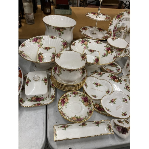 37 - A VERY LARGE COLLECTION OF ROYAL ALBERT OLD COUNTRY ROSES TO INCLUDE TRIOS, JUGS, SUGAR BOWLS, COFFE... 