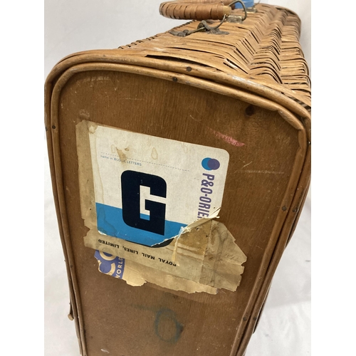 56 - A VINTAGE BASKET SUITCASE WITH VARIOUS P&O STICKERS (HANDLE A/F)