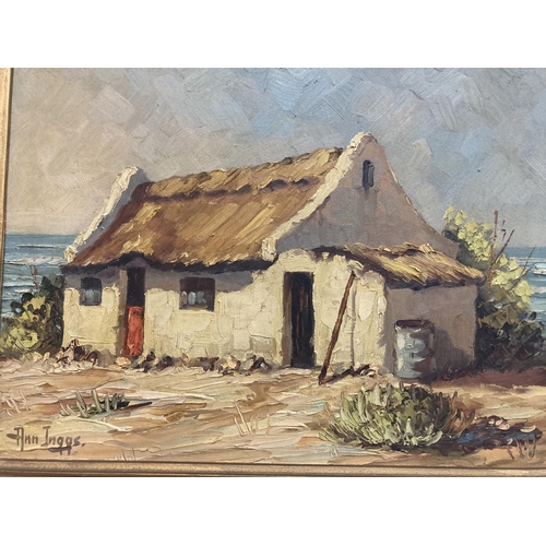 81 - AN ANN INGGS 1936 SOUTH AFRICA FRAMED OIL PAINTING OF A HOUSE BY THE SEA