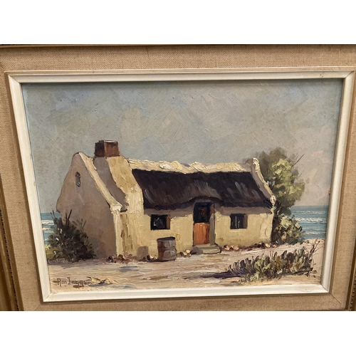 82 - AN ANN INGGS 1936 SOUTH AFRICA FRAMED OIL PAINTING OF A HOUSE BY THE SEA