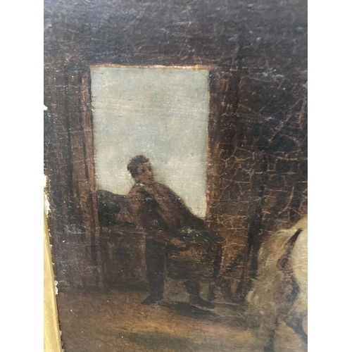 89 - A GILT FRAMED OIL ON BOARD OF A HORSE IN A STABLE