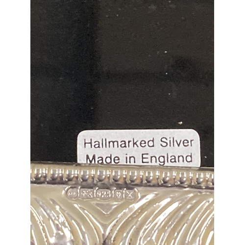 27 - A HALLMARKED LONDON SILVER PHOTOGRAPH FRAME FOR A 6