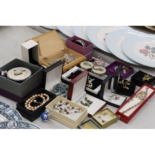 301 - A LARGE QUANTITY OF COSTUME JEWELLERY AND ENAMEL TRINKET B0XES