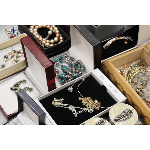 301 - A LARGE QUANTITY OF COSTUME JEWELLERY AND ENAMEL TRINKET B0XES